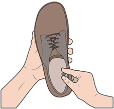 Schuh auf Fremdkörper prüfen