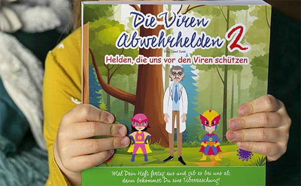 Ein Kind das das Malbuch "Die Virenabwehrhelden 2" vor sich hält.